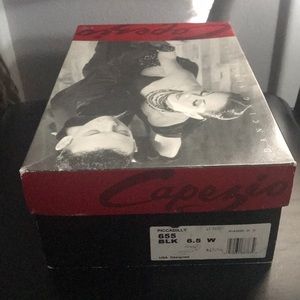 Dancing Shoes in the color black. Size 6.5 wide.